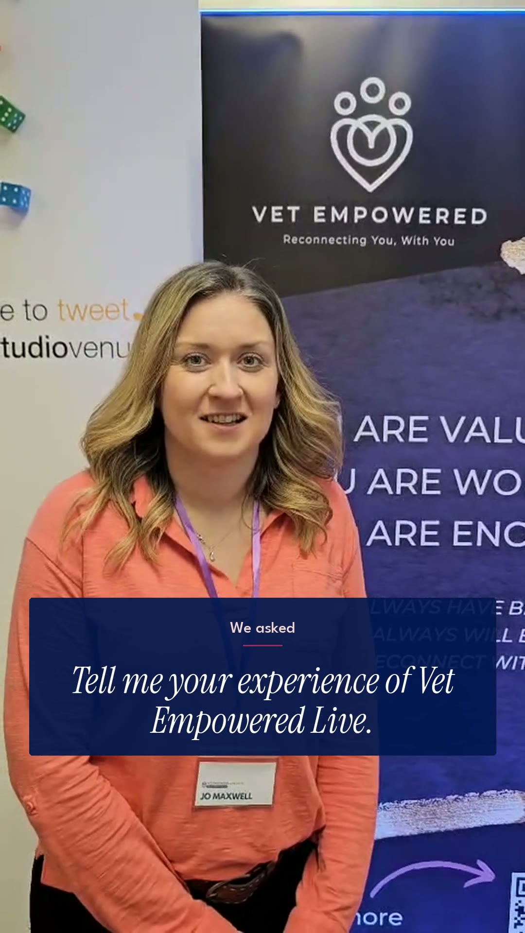 A Vet Empowered Live attendee being interviewed in front of the Vet Empowered banner
