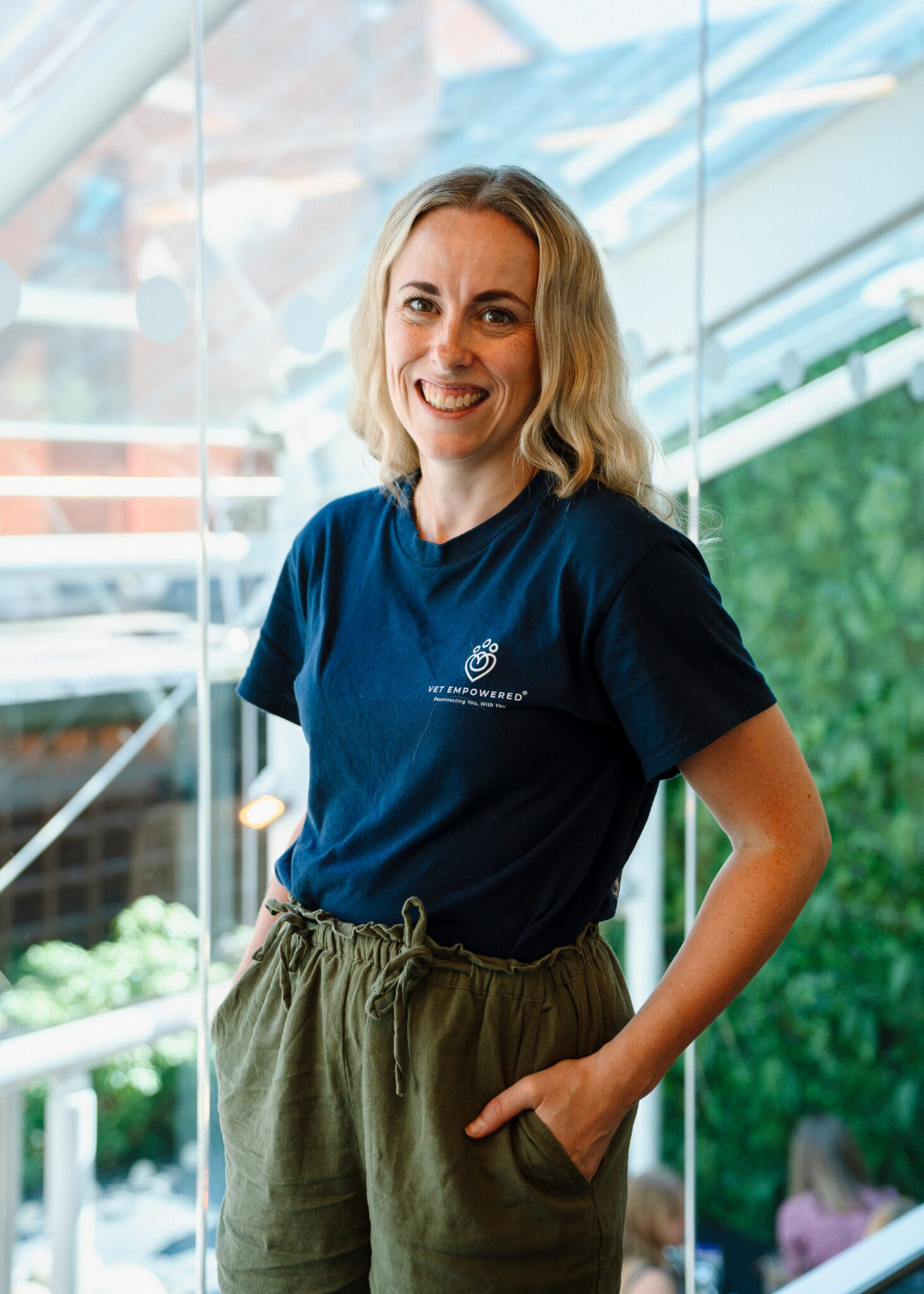 Claire Grigson in a Vet Empowered T-shirt, smiling