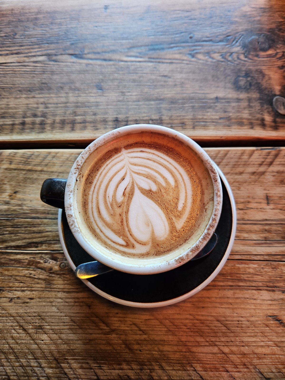 A quiet coffee on a café table
