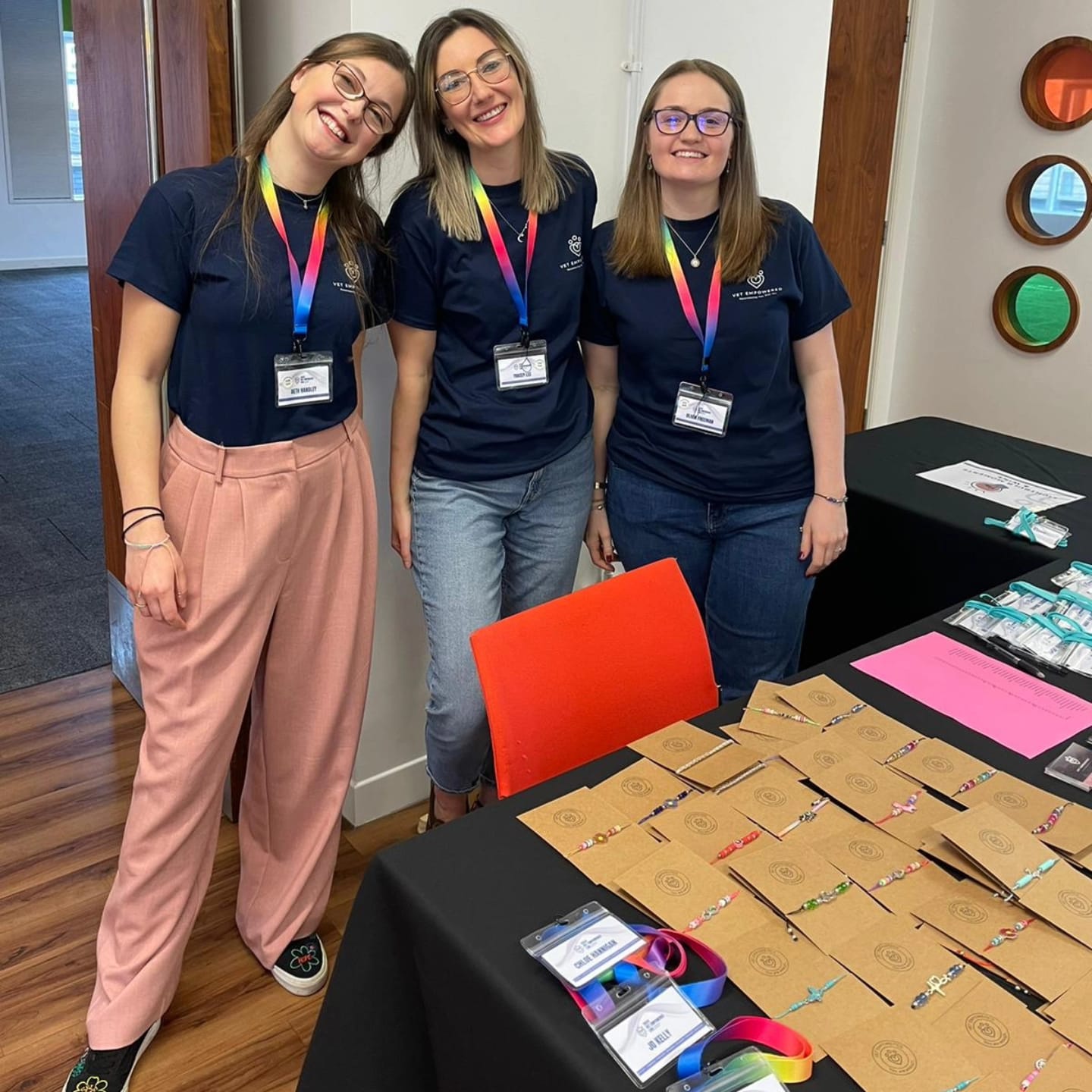 The Vet Empowered team smiling at the welcome desk